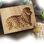 Holz-Backform mit handgeschnitzten Motiven