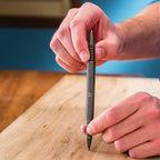 Feather strike needle with replaceable tips