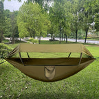 Outdoor hammock with mosquito net and sunshade