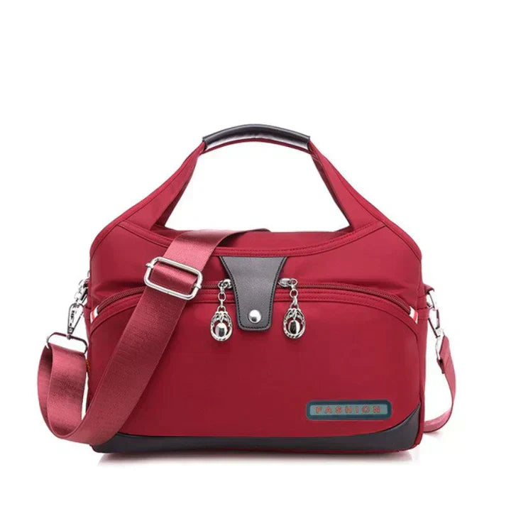 Damen Handtasche mit Schultergurt und mehreren Fächern