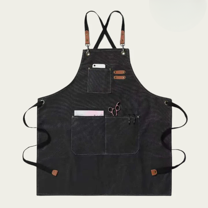 Canvas work apron with cross straps and multiple pockets
