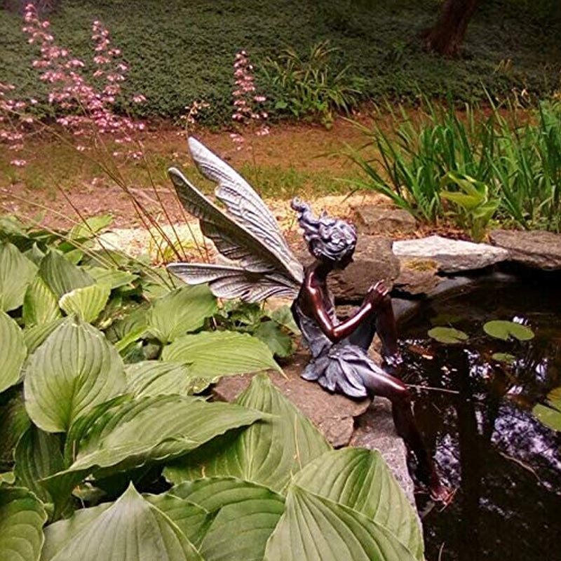 Gartenfigur Fee sitzend aus Harz
