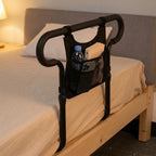Bed rail assist handle with storage pouch, height-adjustable, up to 136 kg