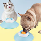 Bowl with floating ball for slow feeding