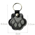 Leather paw keychain with storage compartment
