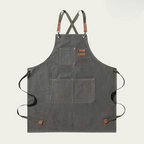 Canvas work apron with cross straps and multiple pockets