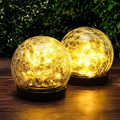 Solar LED garden light with flower pattern
