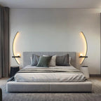 LED wall light with curved shape and integrated light modes