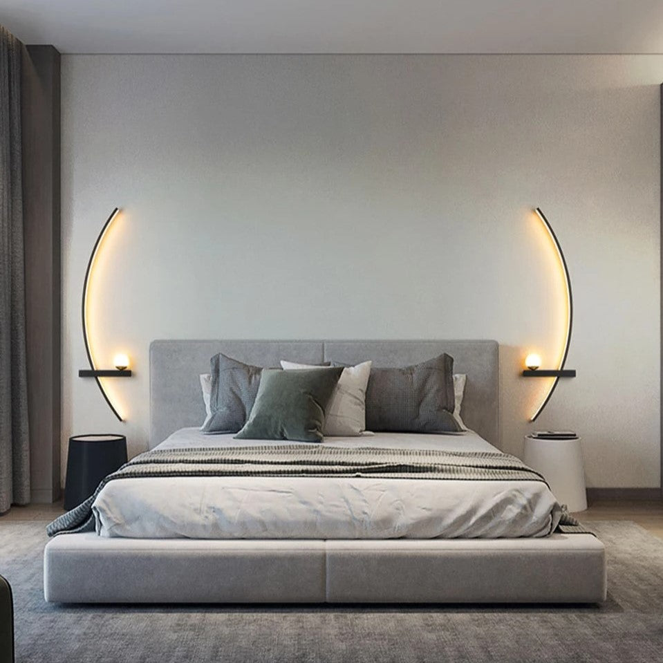 LED wall light with curved shape and integrated light modes