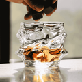 Crystal whisky glass with faceted design
