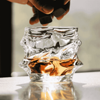 Crystal whisky glass with faceted design