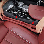 Car seat gap filler with storage compartments
