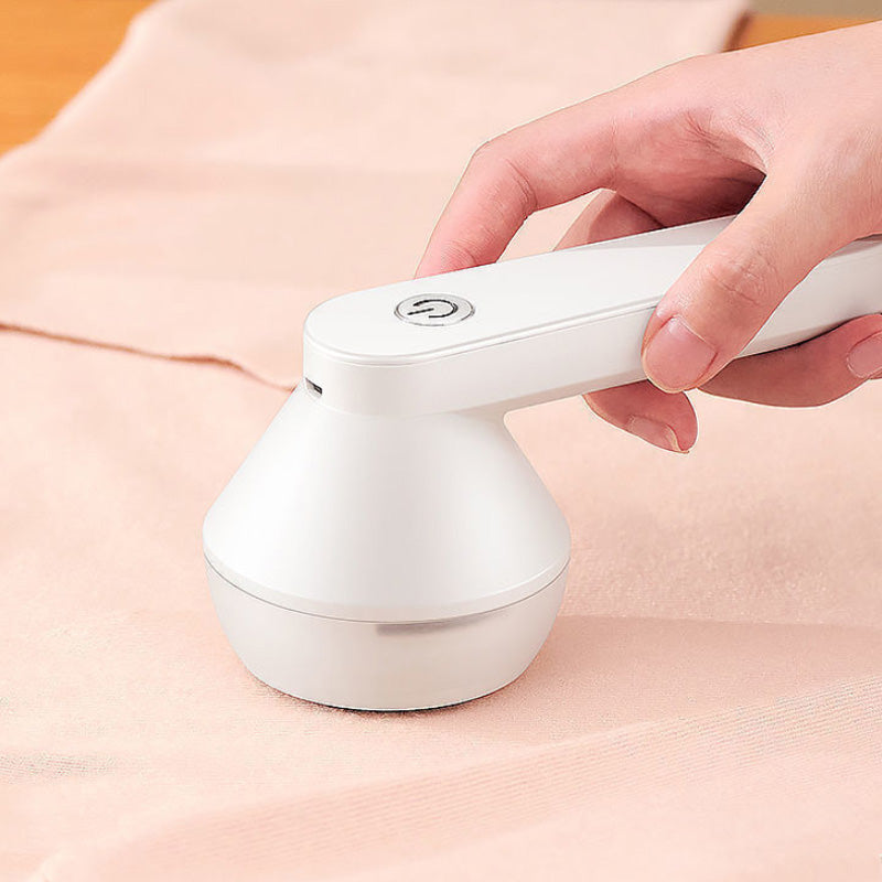 Electric rechargeable lint remover with stainless steel blade