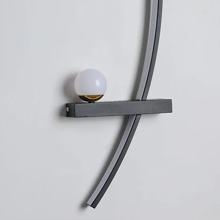 LED wall light with curved shape and integrated light modes