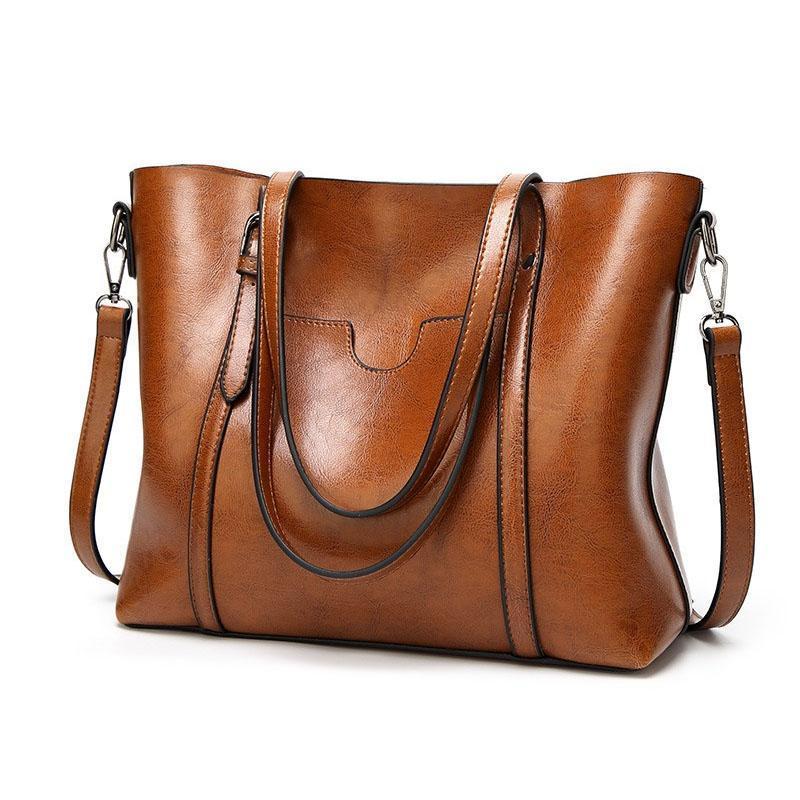 Leather handbag with large capacity and adjustable shoulder strap