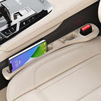 Car seat gap filler with storage compartments