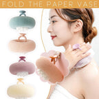 Shower sponge with massage knobs and ergonomic handle