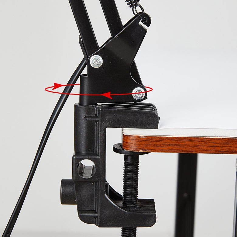 Desk lamp with adjustable arm and table clamp