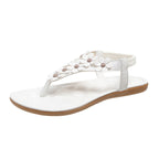 Sandalen mit Blumendetail – Eleganter T-Steg mit dekorativen Blüten