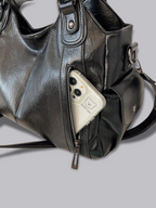 Handtasche mit Reißverschlusstaschen und abnehmbarem Trageriemen