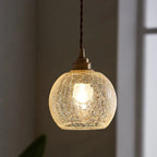 Pendelleuchte Glas Industriedesign mit strukturierter Kugel