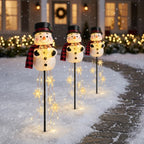 Solar snowman garden stake with light-up globe & snowflake string lights, warm white