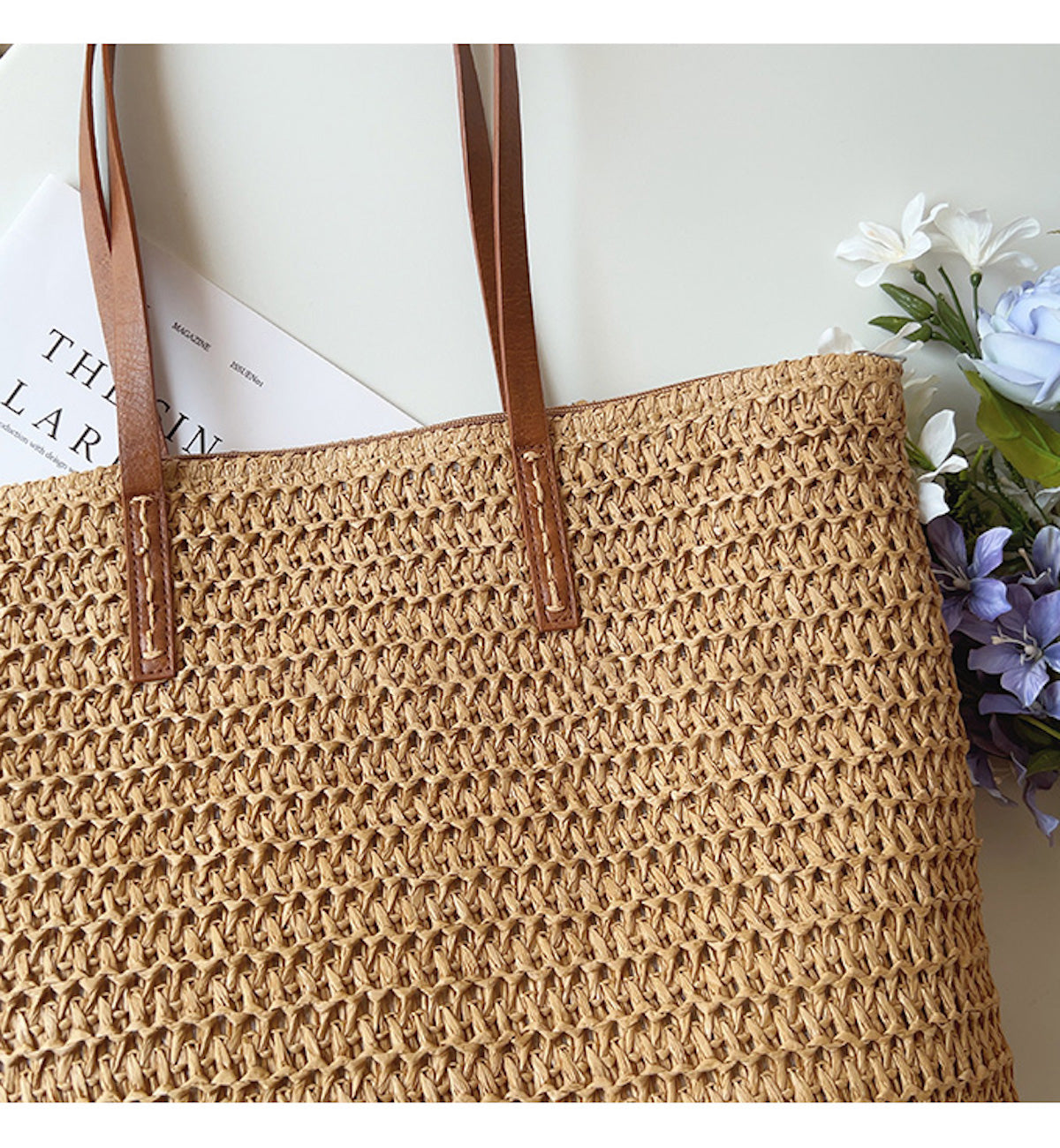 Woven basket bag with leather handles