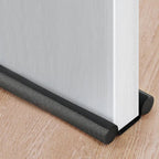 Door seal against drafts with double protection