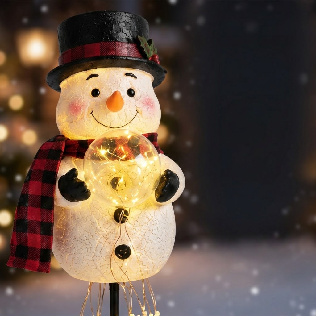 Solar snowman garden stake with light-up globe & snowflake string lights, warm white