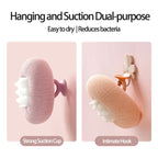 Shower sponge with massage particles and handle