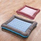 Cooling mat for pets with raised padded edge