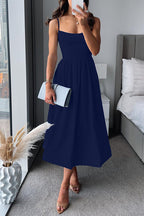 A-line midi dress with spaghetti straps and waist belt