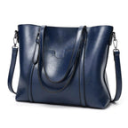 Leather handbag with large capacity and adjustable shoulder strap