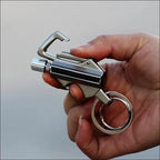 Waterproof fire starter with flint and carabiner