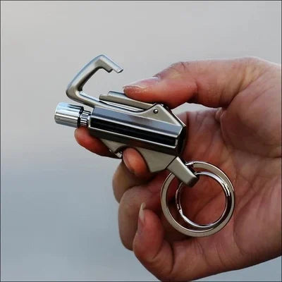 Waterproof fire starter with flint and carabiner