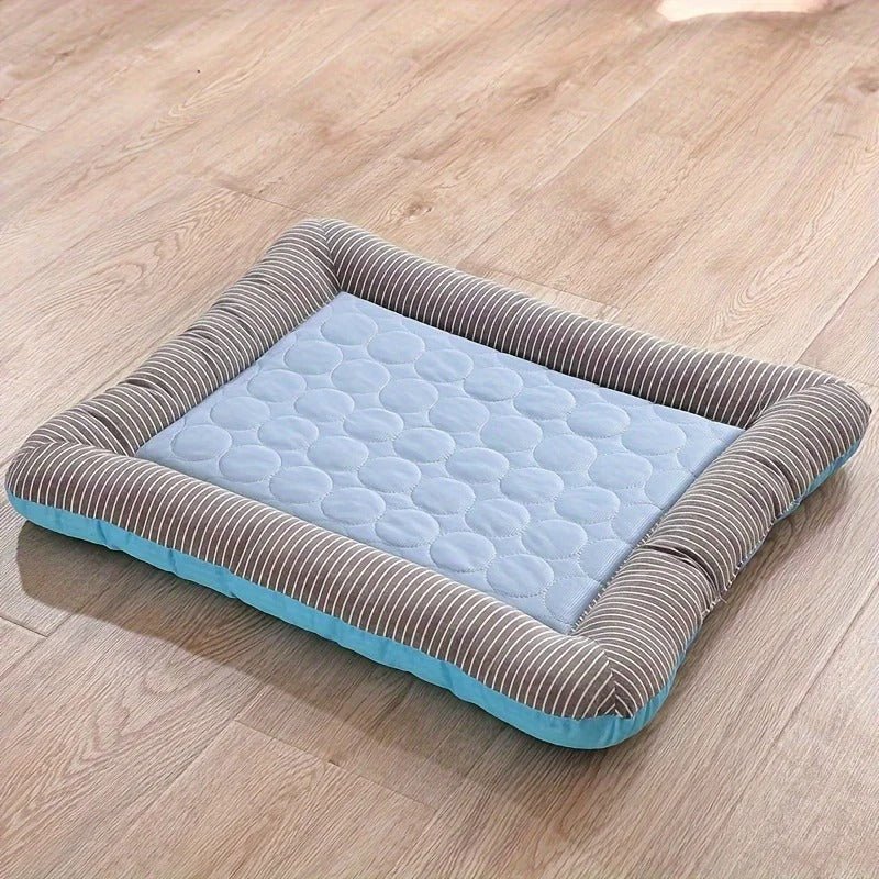 Cooling mat for pets with raised padded edge
