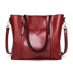 Leather handbag with large capacity and adjustable shoulder strap