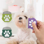 Pet comb with paw print handle