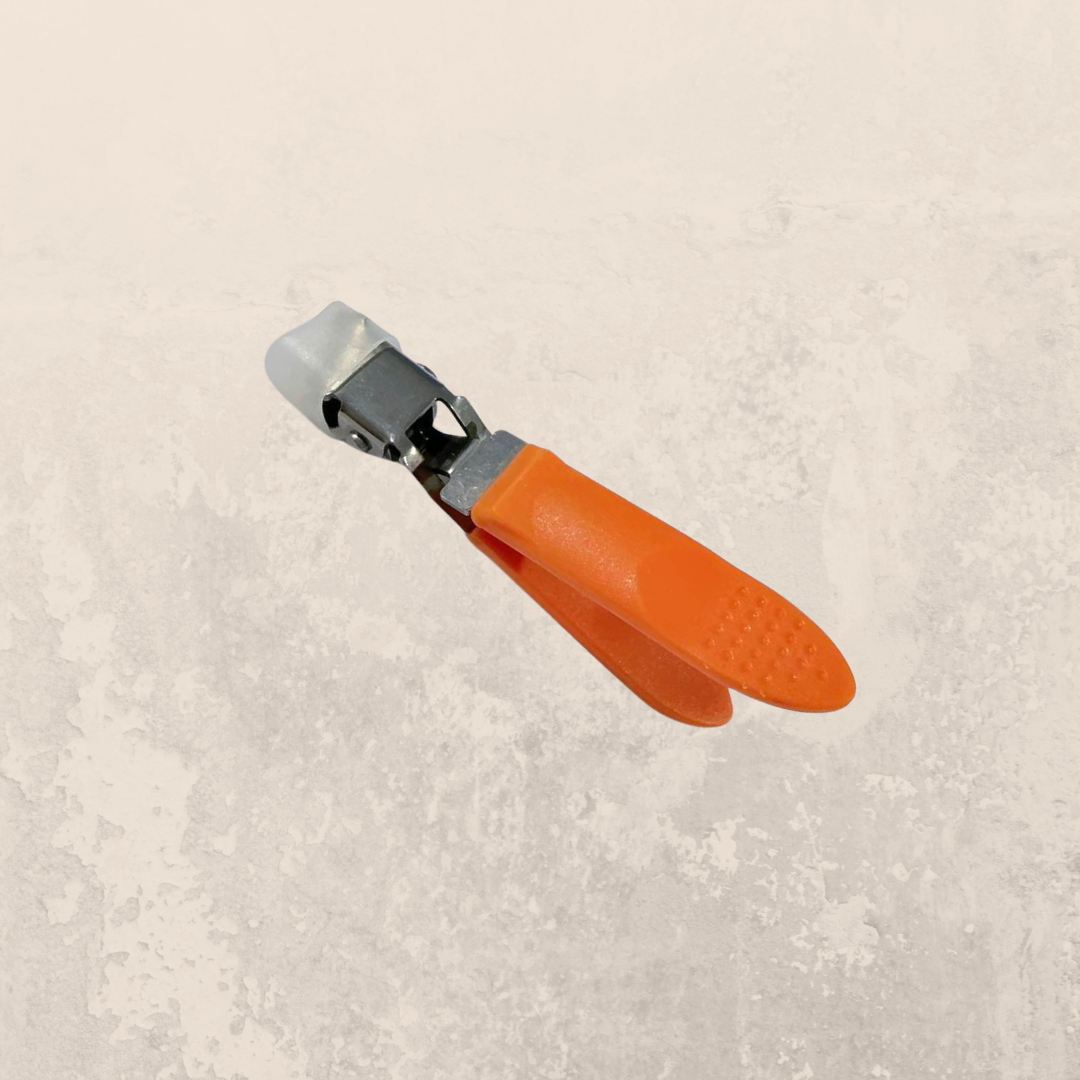 Nail clipper with angled blade for ingrown nails