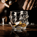 Crystal whisky glass with faceted design