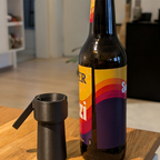 Compact bottle opener with lever mechanism