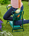 Garden knee pad with tool pockets and seat function