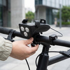 4-in-1 Fahrradlampe mit Handyhalterung, Powerbank und Hupe – USB aufladbar, IPX4