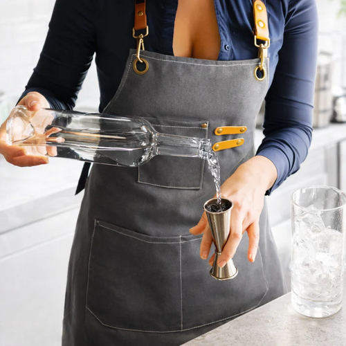 Canvas work apron with cross straps and multiple pockets