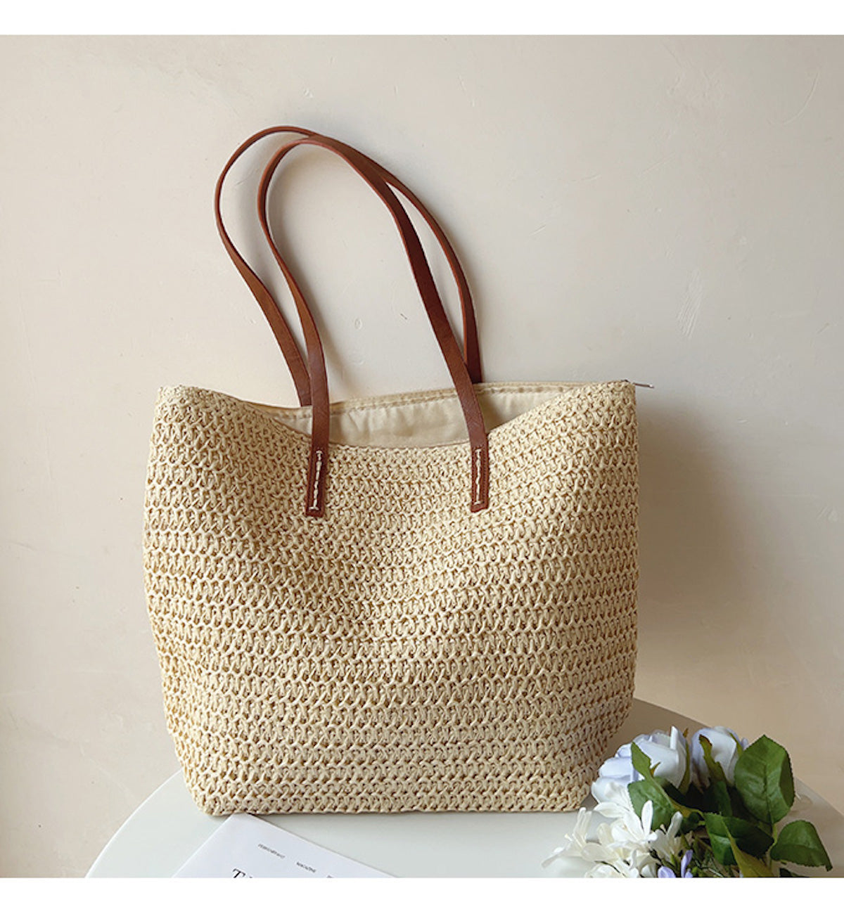 Woven basket bag with leather handles