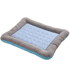 Cooling mat for pets with raised padded edge