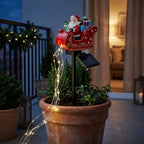 Solar-Gartenstecker Weihnachtsmann im Schlitten oder Rentier – mit funkelndem LED-Lichterschweif