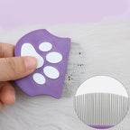 Pet comb with paw print handle