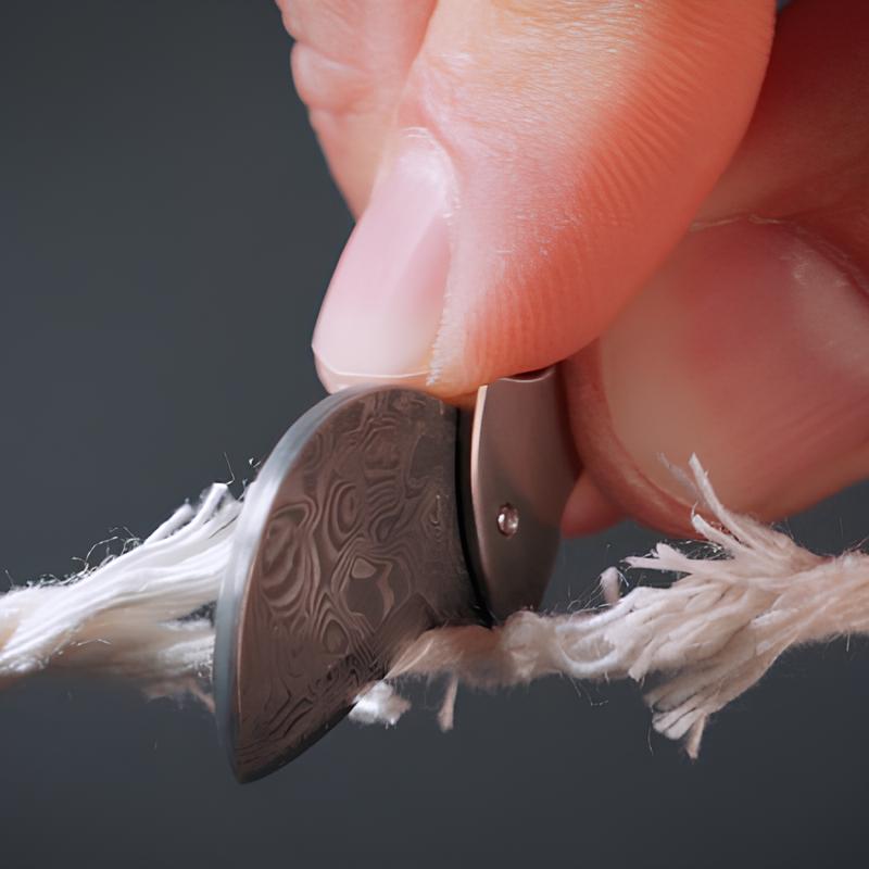 Mini Flaschenöffner Titan mit Damaszener Stahl Schneide
