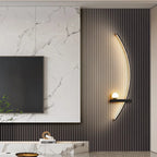 LED wall light with curved shape and integrated light modes